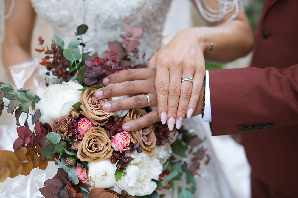 Couple Wearing Wedding Rings